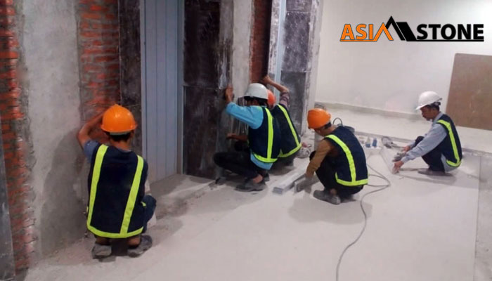 Thi công ốp đá cửa thang máy